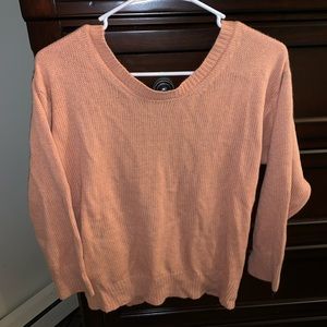 Coral light sweater with open back